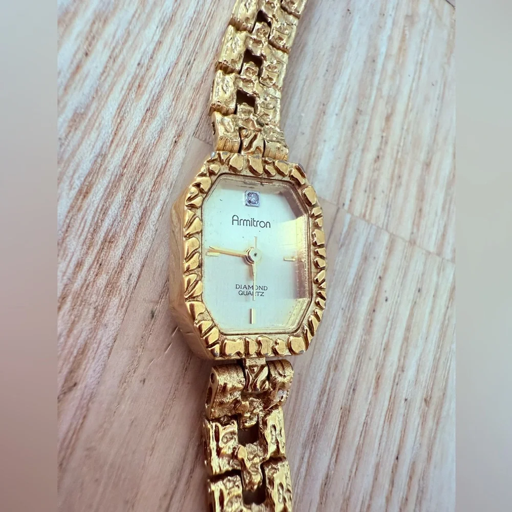 Armitron ladies octagonal gold tone diamond dress watch NEW BATTERY